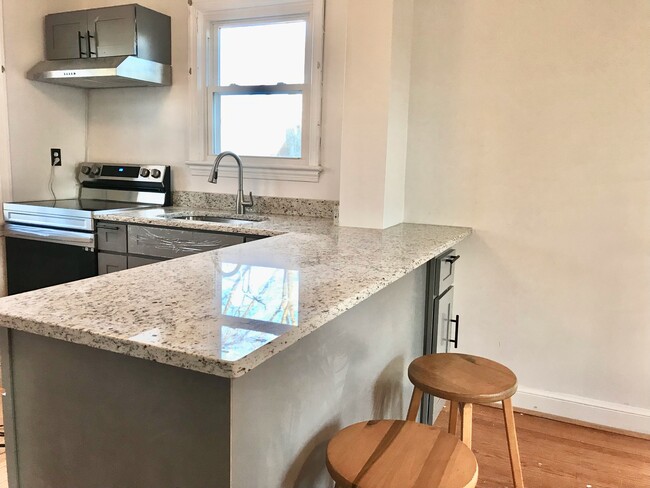 Granite countertop. - 4806 Cherokee St