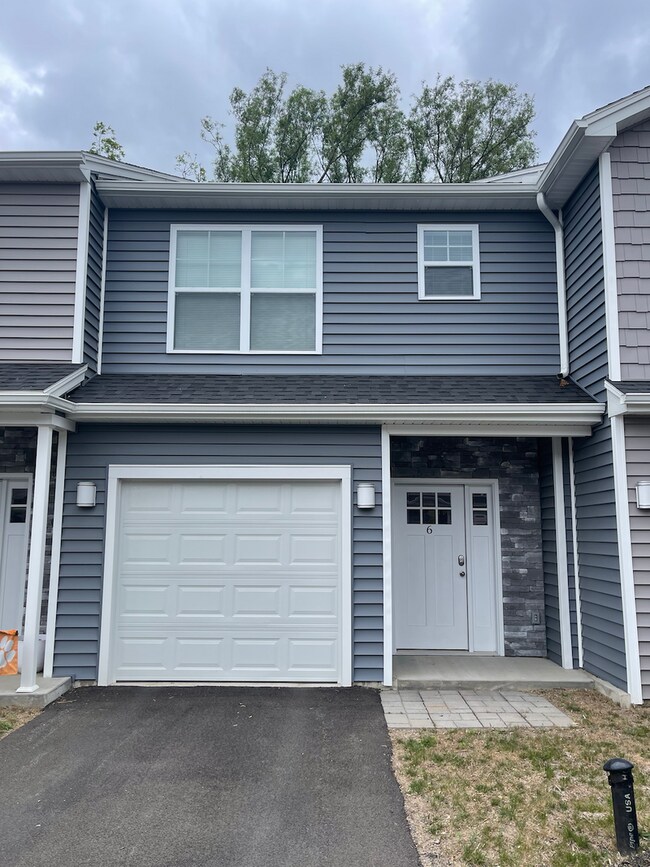 Building Photo - Marion Gardens Townhomes - New Baldwinsville Development