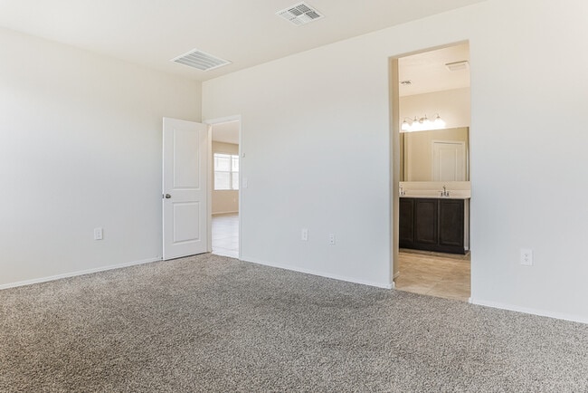 Building Photo - Bright Coolidge 4-Bedroom Home