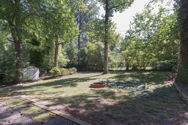 Building Photo - Gorgeous 3 bed 2 bath home with finished basement/carport in NW Greensboro! Lawn care included.