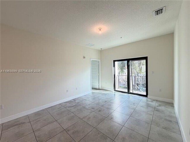 Building Photo - 4640 NW 84th Ave