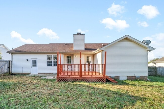 Building Photo - Adorable home with fenced back yard coming...