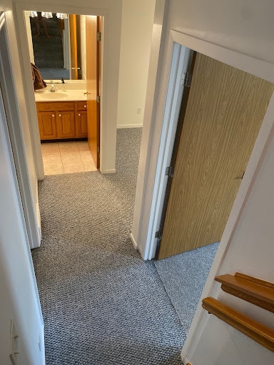 From stairway: bedroom on right, office is the open space and bathroom. - 9 Daytona Beach Dr