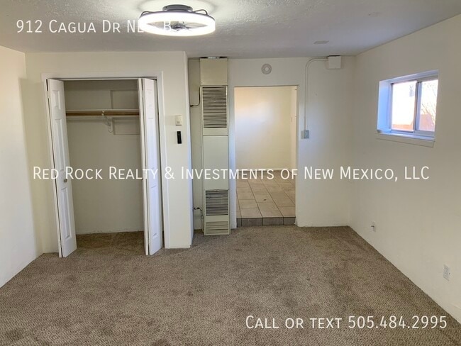 Building Photo - 912 Cagua Dr NE