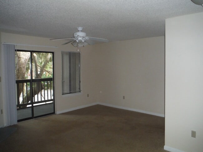 Building Photo - Nice 2nd FL Condo with Screened Balcony