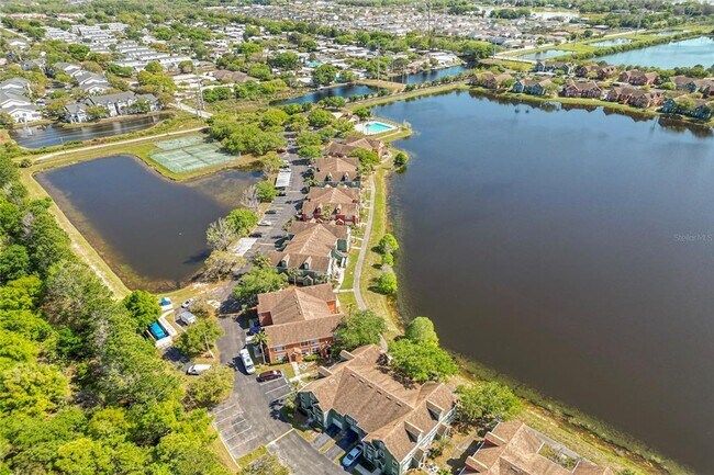 Building Photo - 9158 Lake Chase Island Way