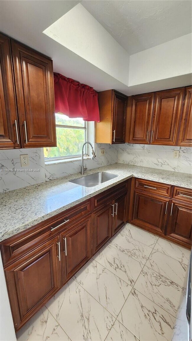 Building Photo - 3090 Coral Springs Dr