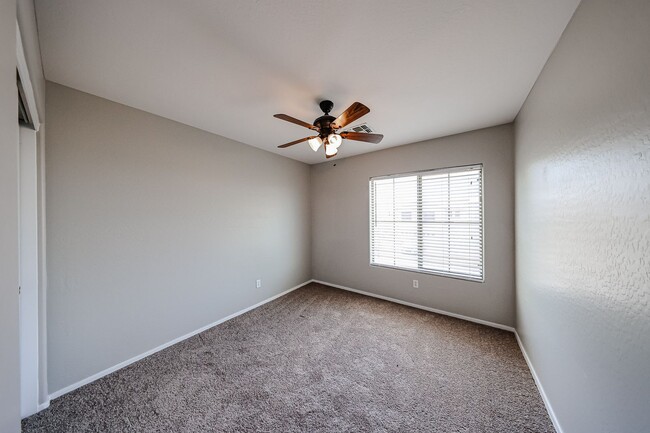 Building Photo - Welcome to this spacious 4 bedroom, 2.5 ba...