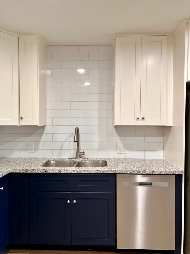 Kitchen with granite countertops and subway tile - 1266 Dove St