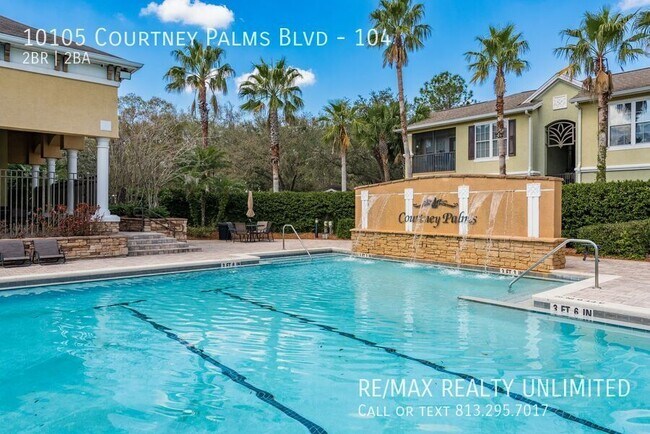 Building Photo - 10105 Courtney Palms Blvd