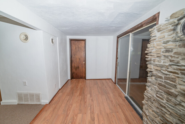 Multi-purpose room between living room, bathroom, mudroom, and dining room - 22 Muckey Rd