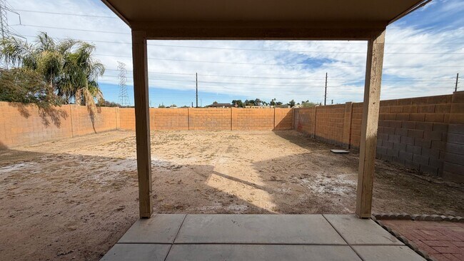 Building Photo - Two Story Home with NEW tile and a large backyard!