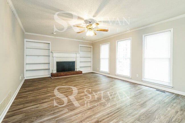 Building Photo - The living is easy in this 4 bedroom, 2.5 ...
