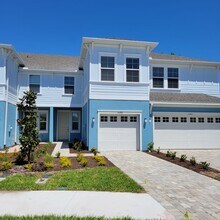 Building Photo - Annual UNfurnished almost BRAND NEW townho...