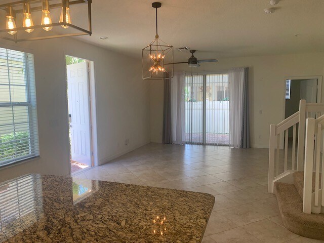 Building Photo - 9488 SW Merlin Ct