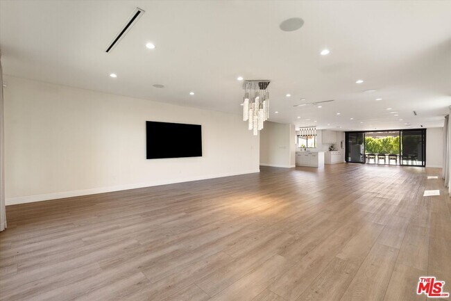 Building Photo - 11700 Woodley Ave