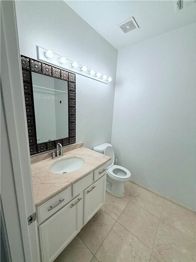 Building Photo - Amazing condominium in gated upscale neigh...
