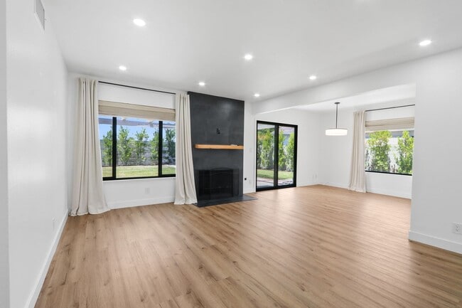 Building Photo - Renovated Lake Forest Home with Expansive Yard & Modern Finishes