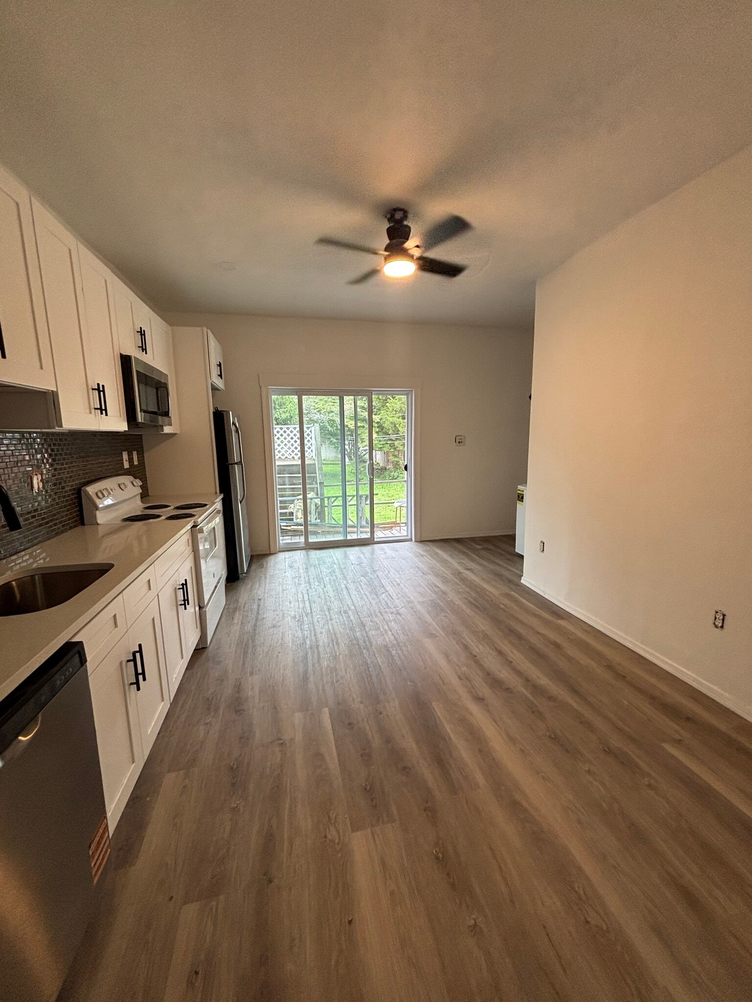 Patio sliding doors to a private deck out back. - 17 E Glenside Ave