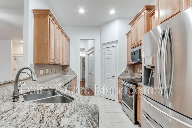 Building Photo - 10517 Queensbury Dr