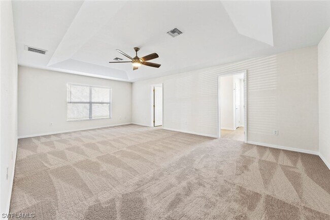 Building Photo - 4BR Home in Gated Town Lakes Community with Lake View
