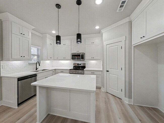 Building Photo - Tucked Into A Prime Spot In Bella Vista Wi...