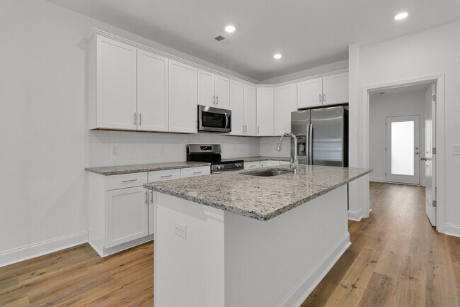 Building Photo - 502 Twin Rivers Dr
