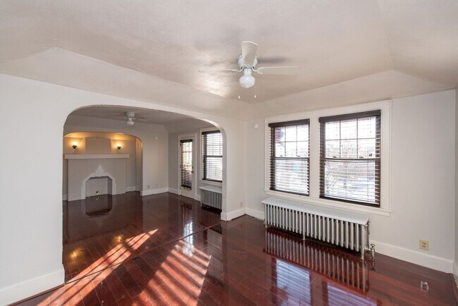 Building Photo - Beautifully updated Tudor style duplex. Up...