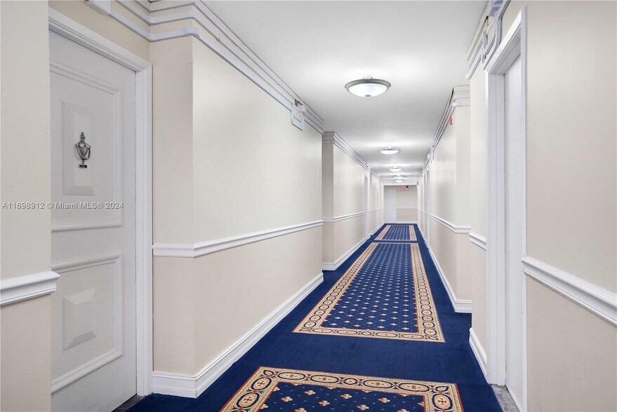 Building Photo - 5005 Collins Ave