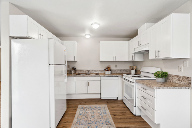 Experience culinary excellence in this stunningly designed kitchen space. - Stillwood Apartments