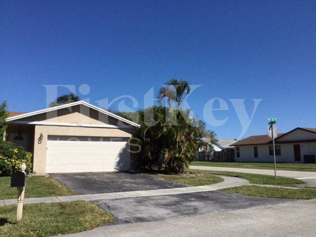 Building Photo - 9703 NW 42nd Ct