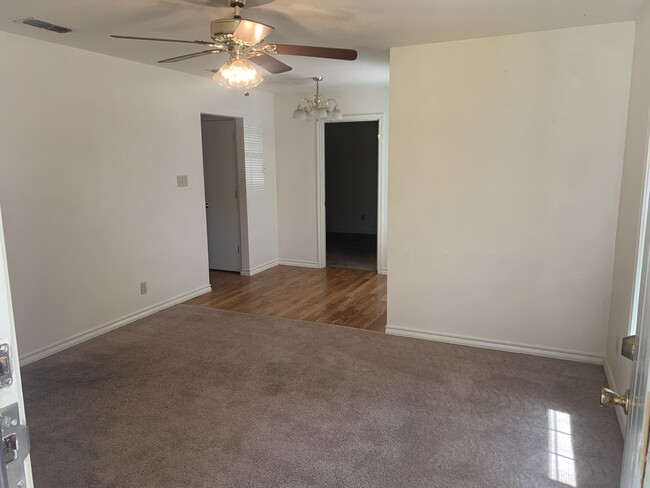 Living Room/Dining Room - 1034 S Crockett Dr