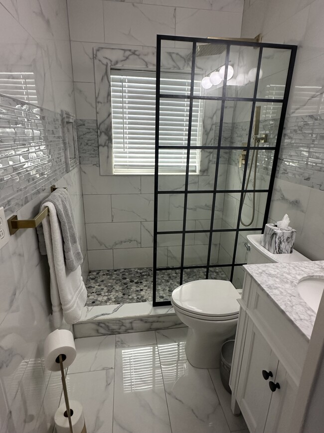 Fully remodeled bathroom. - 318 Madison St