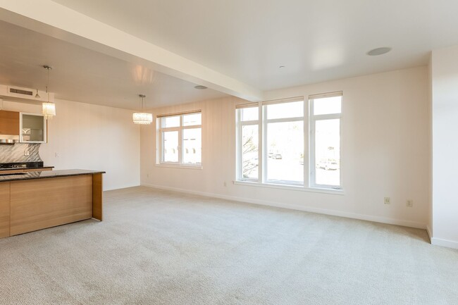 Building Photo - Stunning 2 Bedroom 2 Bath condo, with 2 Parking spots in the heart of vibrant Kirkland for Rent