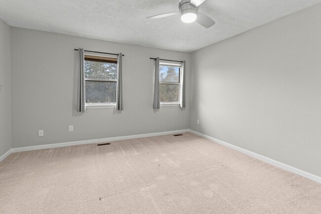 Building Photo - Broad Ripple townhome with garage, updated kitchen, and walkable convenience!