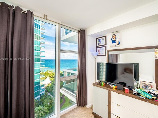 Building Photo - 10275 Collins Ave