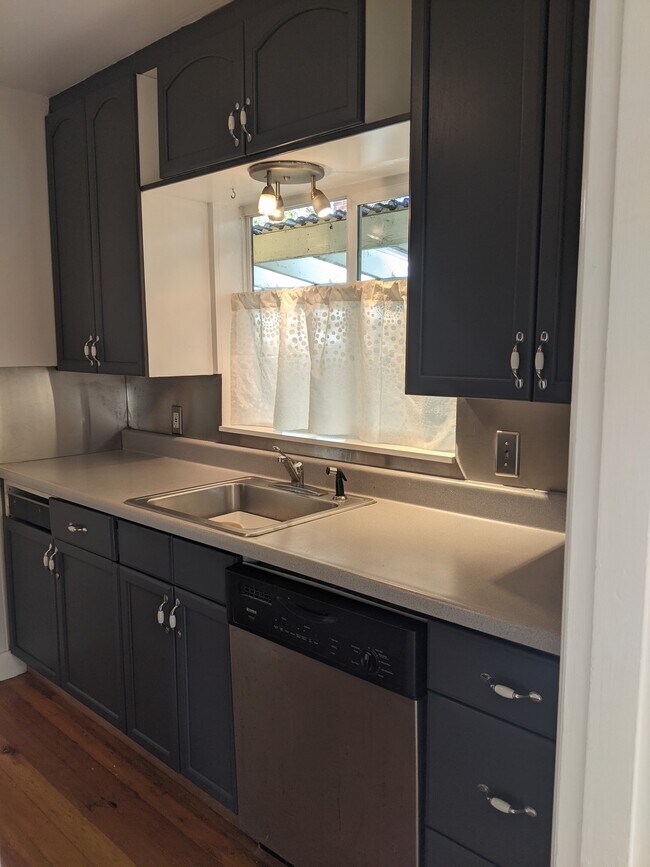 Refreshed kitchen w/ new stove - 913 NE Church Street