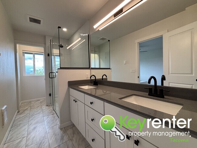 Building Photo - Stylish 4-Bedroom Home with Finished Basem...