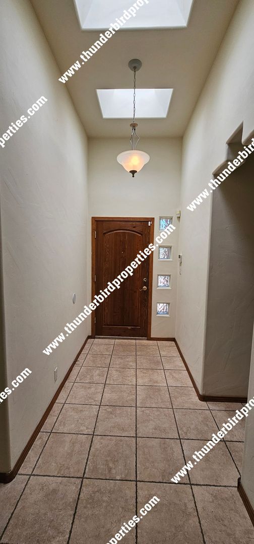 Building Photo - Beautiful and Spacious in NE Heights Gated...