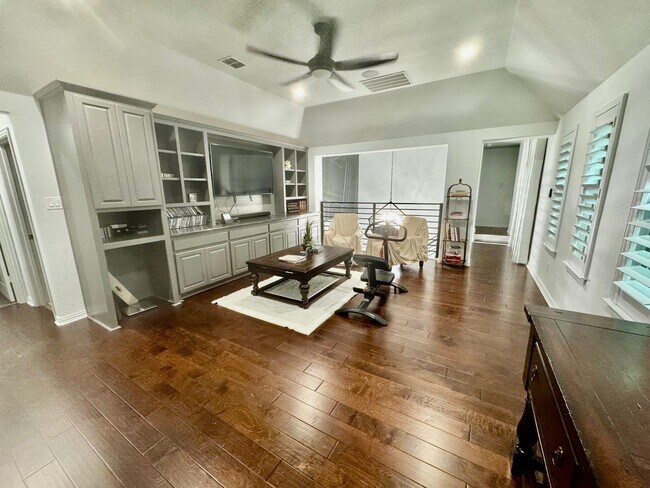 Building Photo - A must see in highly sought after Windsong...