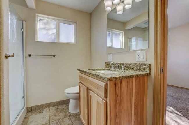 Building Photo - 1/2 acre in the with RV Hook ups