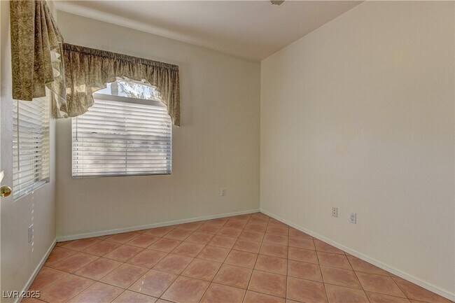 Building Photo - 5415 W Harmon Ave