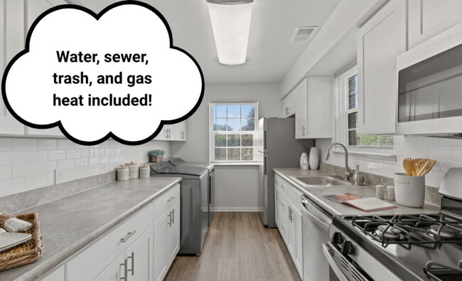 Signature Kitchen Style in 3-Bedroom Floor Plan - Powder Mill Apartments
