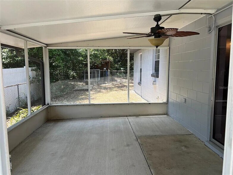 Screenroom off Kitchen with Sliding Glass Doors and Working Fan - 261 Deleon Rd