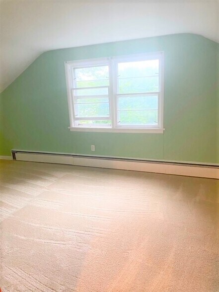 Primary bedroom, has additional storage under eaves - 3 Alton Rd