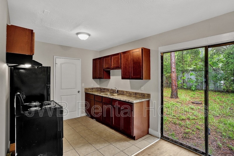 Building Photo - 9613 Priory Ave