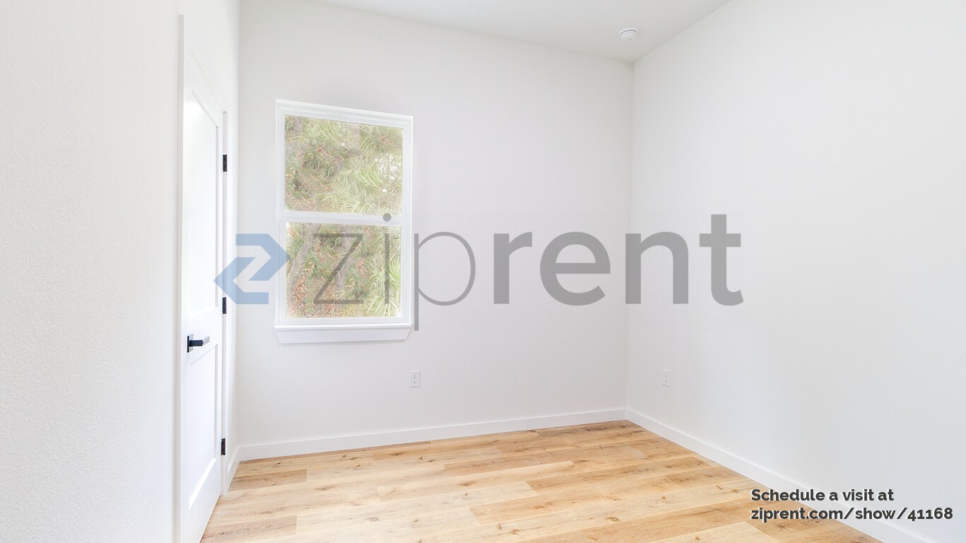 Building Photo - 8202 N Triana Dr