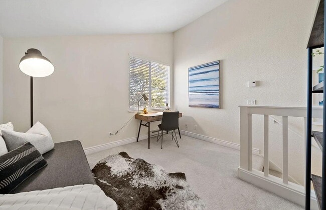 Building Photo - 1 bedroom plus loft features a functional floorplan with high ceilings