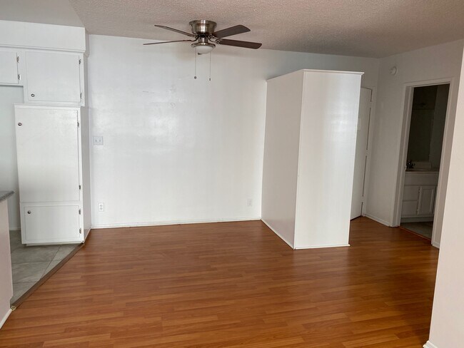Dining area and new ceiling fan. - 1731 N Normandie Ave