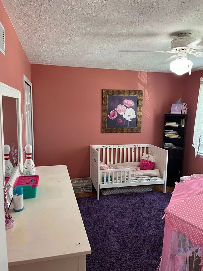 Building Photo - Updated & Landscaped 4 Bedroom, 4 Bath Hom...